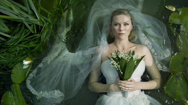<p><strong>Here Bums The Bride: </strong>Lars von Trier's <em>Melancholia </em>centers on a newlywed (Kirsten Dunst) whose chronic depression leaves her singularly well-equipped to confront the end of the world. </p>
