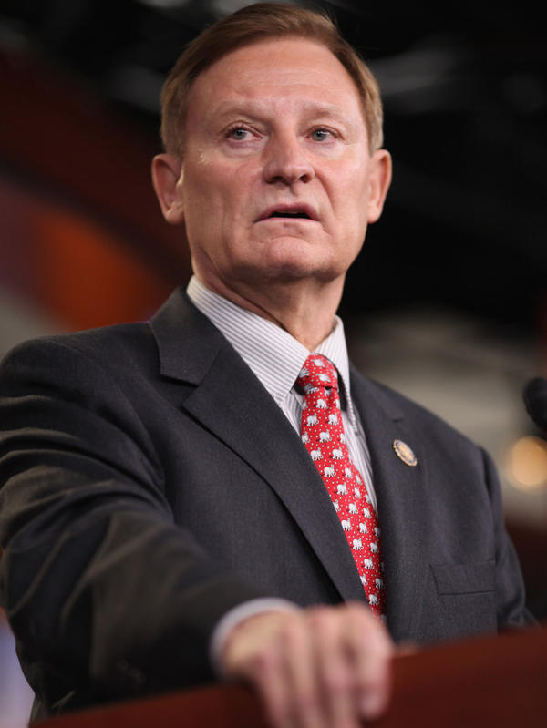 House Financial Services Committee Chairman Spencer Bachus faces questions about his stock purchases. 