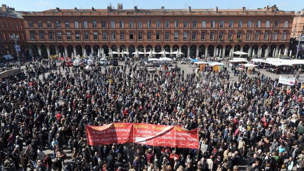 Hundreds of people gather on March 23 on the main public square in Toulouse, France, to pay homage to the seven victims of self-proclaimed al-Qaida militant Mohamed Merah. 
