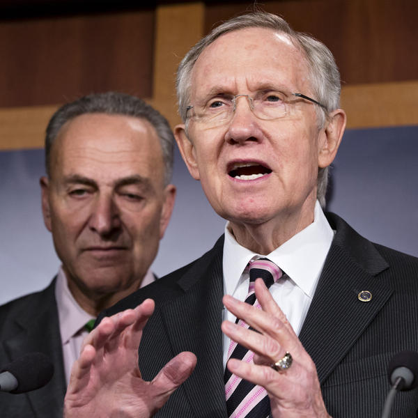 Senate Majority Leader Harry Reid, accompanied by Sen. Charles Schumer, D-N.Y., tells reporters that Republicans need to "get a life and talk about something" other than Obamacare.