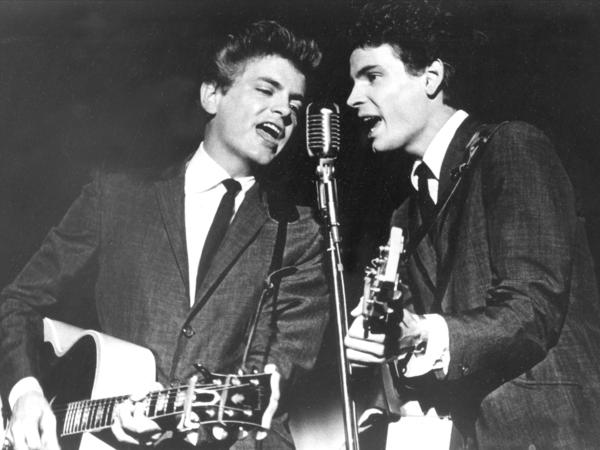 The Everly Brothers, Phil, left, and Phil, perform in 1964.