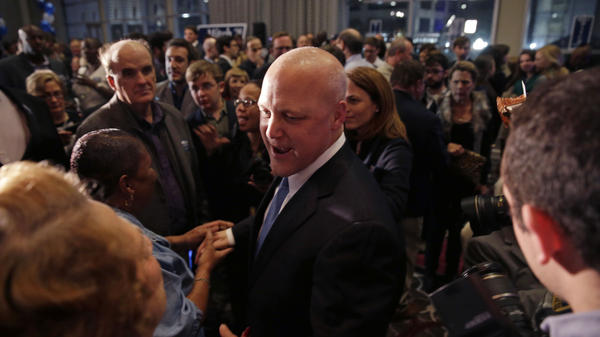 New Orleans Mayor Mitch Landrieu greets supporters after winning reelection in New Orleans on Saturday.