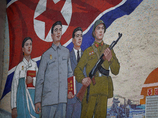 A propaganda painting is seen outside the People's Palace of Culture in Pyongyang, North Korea, in 2011. North Korean state media reported Friday that the nation has detained a U.S. tourist.