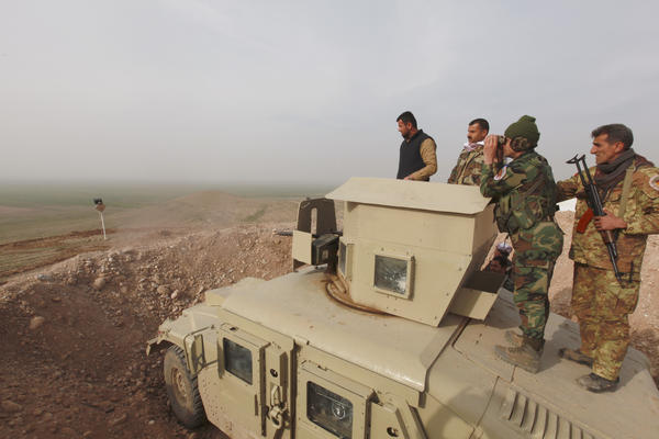 Kurdish Peshmerga fighters take positions on the outskirts of Mosul on Jan. 26. The U.S. military says an offensive to drive the Islamic State out of Mosul is expected around April or May.