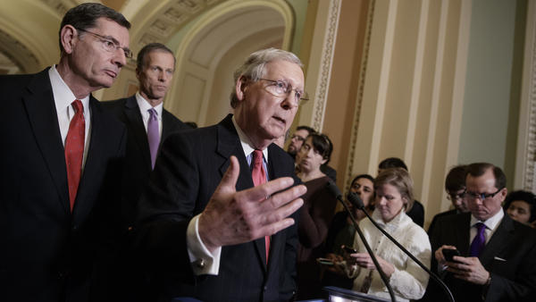 Senate Majority Leader Mitch McConnell and other GOP leaders take questions from reporters about President Trump's ousted national security adviser, Michael Flynn, on Tuesday.