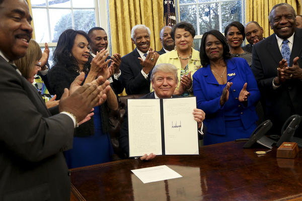 President Donald Trump signed an executive order pertaining to historically black colleges and universities in the Oval Office.