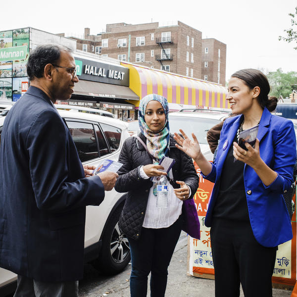 A May 2016 photo provided by the Alexandria Ocasio-Cortez campaign shows the candidate during a Bengali community outreach event in New York.