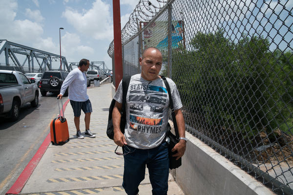 William Moreno is trying to reach the U.S. with his family. He has been waiting several days for the chance to claim asylum. But he has a young daughter and says he is not sure how much longer she can withstand the heat.