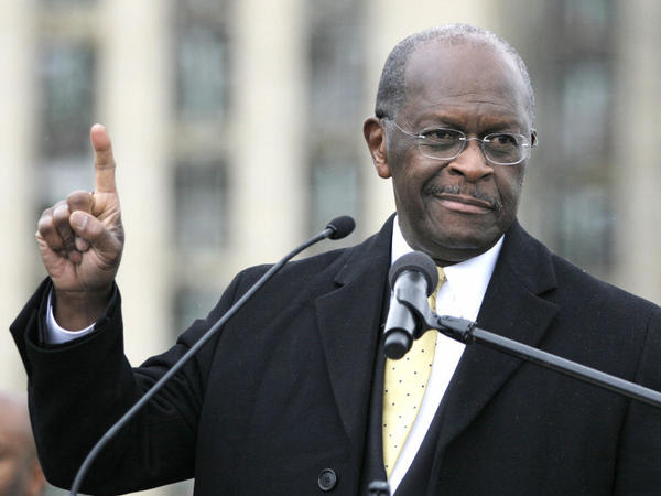 <p>Republican presidential candidate Herman Cain speaks on Friday while unveiling his "Opportunity Zone" economic plan in front of the Michigan Central Station, an abandoned train depot in Detroit.</p>