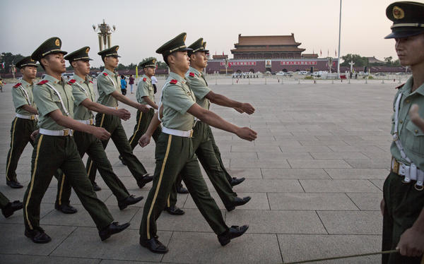 Chinese paramilitary officers march in Tiananmen Square on Tuesday in Beijing. The government has launched an unprecedented effort to suppress any public, or private, commemoration of June 4, 1989.
