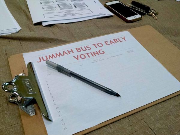 A sign-up sheet for the bus to early voting after Friday prayers