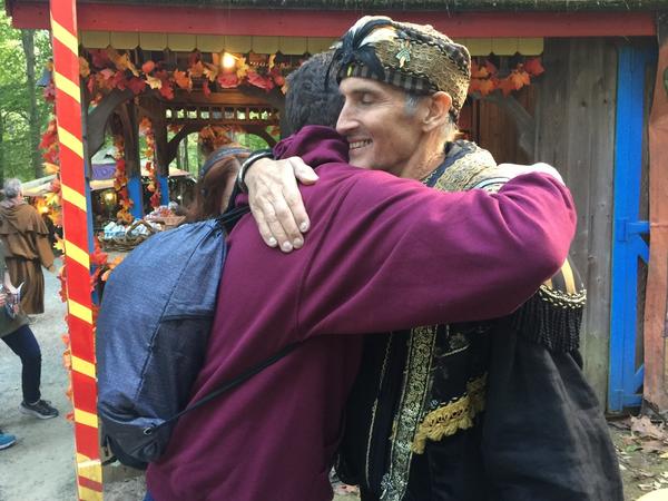 Johnny Fox hugs a fan at the Maryland Renaissance Festival. This fall, Fox has made a triumphant comeback even as he battles with health issues.