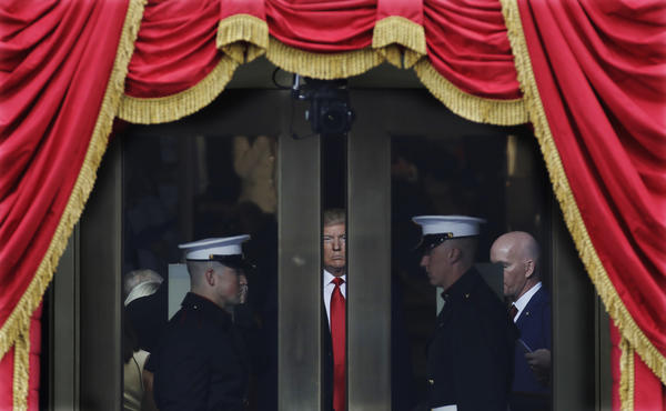 Donald Trump waits to step onto the portico for his presidential inauguration on Jan. 20.