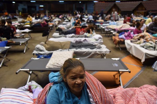 Puerto Ricans take refuge ahead of Hurricane Maria in the Clemente Coliseum in San Juan on Sept. 19.