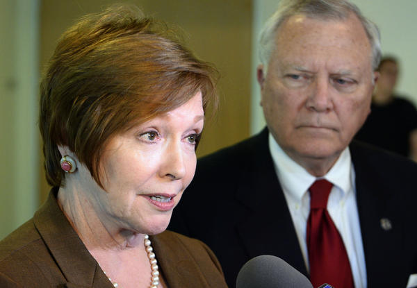 Brenda Fitzgerald, Georgia Department of Public Health commissioner, and Gov. Nathan Deal respond to questions about Ebola victims at Emory University Hospital and efforts to screen for Ebola in 2014. A report in <em>Politico</em> revealed documents showing several new investments, including in a tobacco company, by Centers for Disease Control and Prevention Director Brenda Fitzgerald.