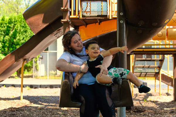 Mother and son take a play break near their home in Douglassville, Pa. "I'm really lucky, Kelly Zimmerman says, because my family has made a lot of adjustments — a lot of changes to help me get back on my feet."