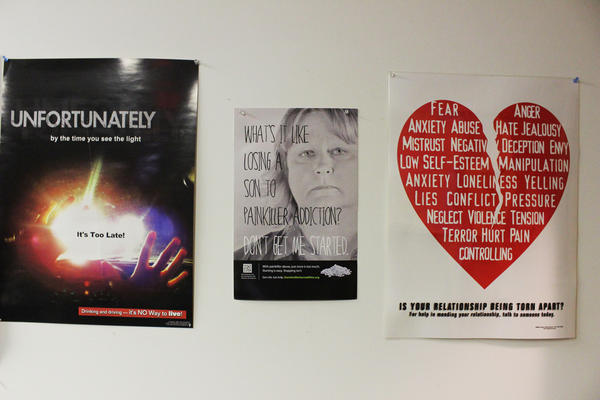 Posters hang in the common room at Health Recovery Services, one of three rehab centers on Main Street in McArthur, Ohio.
