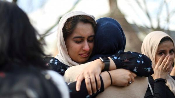 At the University of Pennsylvania in Philadelphia on Friday, Nayab Khan, 22, cries at a vigil to mourn for the victims of the Christchurch mosque attacks in New Zealand.