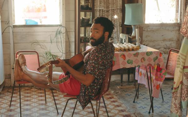 Donald Glover in a still from <em>Guava Island</em>, which he stars in with Rihanna. The film premiered at Coachella, where Glover's musical act Childish Gambino headlined on Friday.