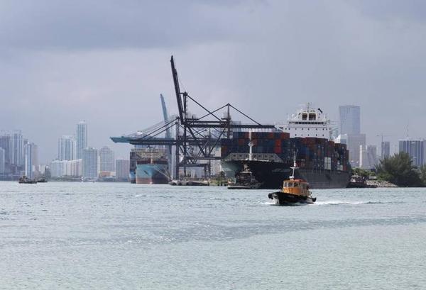 A cargo ship leaves PortMiami following the $205 million dredge.