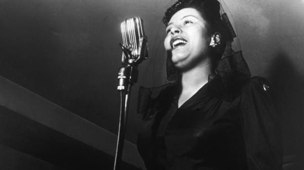 Billie Holiday sings at a Sunday afternoon jam session.