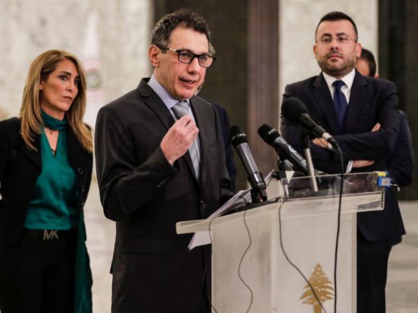 Nizar Zakka (center), a Lebanese national and U.S. resident arrested in Iran in 2015 and sentenced to 10 years in jail on espionage charges, gives a press conference in Beirut after he was freed in early June.