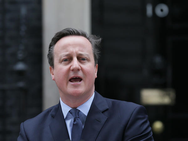 British Prime Minister David Cameron makes a statement outside 10 Downing Street in London on Saturday.