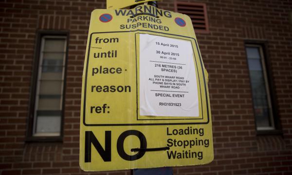 A suspended parking sign that was posted in London in 2015. Joshua Browder, a 20-year-old from London, who's now attending Stanford, has come up with a bot that can write letters appealing parking tickets. He claims a 60 percent success rate in cities where it is being used, including London, New York and Seattle.