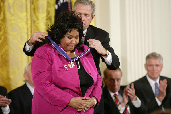 George W. Bush awards Franklin the Presidential Medal of Freedom at the White House in 2005.