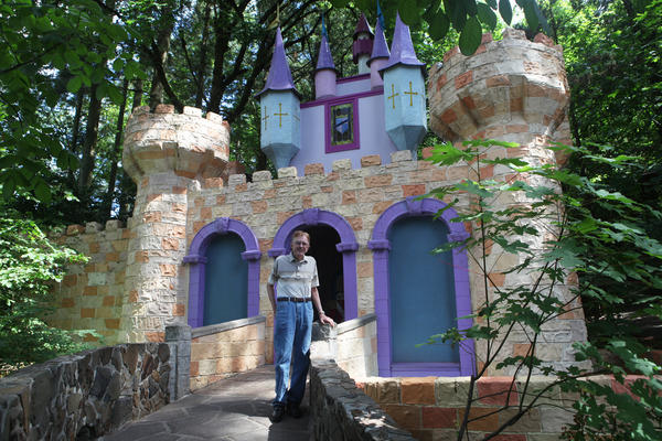 Roger Tofte opened the Enchanted Forest in Turner, Ore., in 1971, after spending seven years building the family-run theme park. The 88-year-old stands in front of one of his first creations, the castle at the entrance to Storybook Lane.