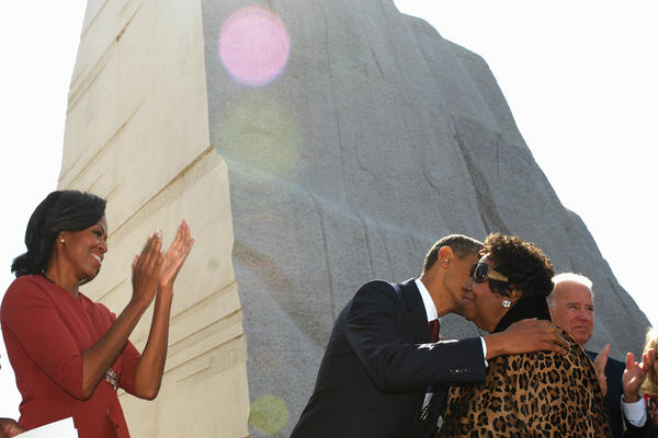 President Obama kisses Aretha Franklin after she performed at the dedication of the Martin Luther King Jr. Memorial in October 2011, in Washington, D.C.