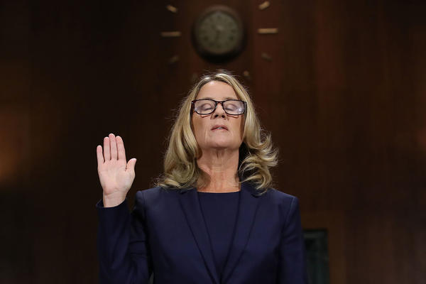 Christine Blasey Ford is sworn in ahead of testifying before the Senate Judiciary Committee on Thursday.