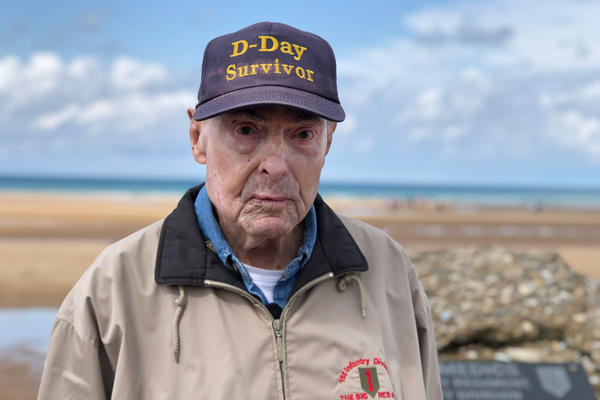 Ray Lambert, 98, stands on Omaha Beach, where 75 years ago, he fought during the D-Day invasion.