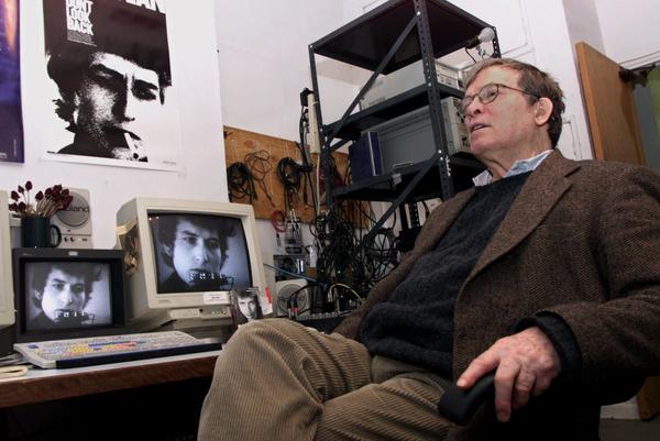 Documentary filmmaker D.A. Pennebaker sits near an editing station showing images of singer-songwriter Bob Dylan on Thursday, Jan. 27, 2000. Pennebaker, who died on Aug. 1, is most famous for his film <em>Don't Look Back,</em> a critically acclaimed chronicle of Dylan's three-week 1965 British tour.