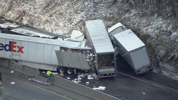 A multivehicle crash along the Pennsylvania Turnpike killed five people and at least 60 more are injured on Sunday. A tour bus traveling to Cincinnati rolled over and was then hit by two tractor-trailers, according to Stephen Limani, a public relations officer for the Pennsylvania State Police.