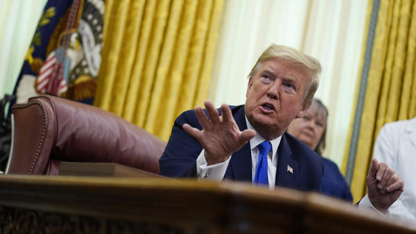 President Trump speaks during an event to honor World Nurses Day in the Oval Office of the White House on Wednesday.