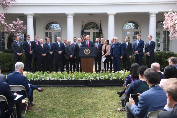 Surrounded by some members of the White House Coronavirus Task Force, President Trump speaks at a press conference on COVID-19 in March in the Rose Garden. Of the 27 task force members, two are women, standing to Trump's left: Dr. Deborah Birx and Seema Verma (holding the sheaf of papers).