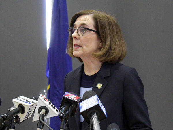 Oregon Gov. Kate Brown announced a statewide ban on indoor dining at bars and restaurants at a press conference in Portland on March 16. Nearly four months later, with COVID-19 cases on the rise after a phased-in economic reopening, she announced new restrictions including a 10-person limit on social gatherings.