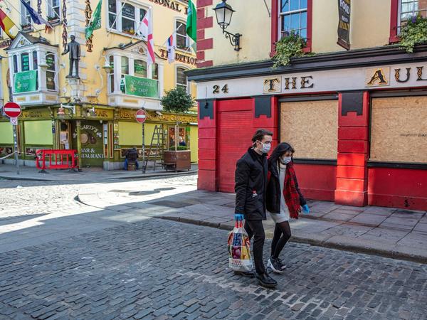 Bars, like this boarded-up pub in Dublin, closed in March. They can open their doors again in Phase Four of Ireland's reopening plan, which is newly delayed until  August.