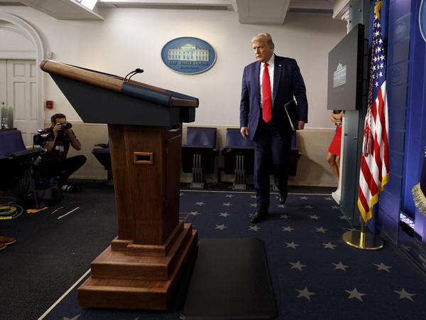 President Trump arrives for a news conference at the White House on Thursday in Washington, D.C.
