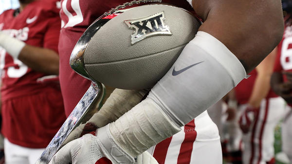 The Big 12 says its schools will start playing their conference games in late September, under a schedule that's been reduced due to the coronavirus. The conference hopes to hold a championship game in December.