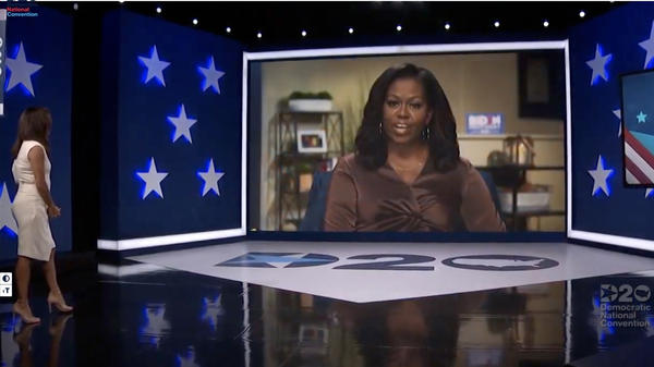 In this screenshot from the 2020 Democratic National Convention's livestream, actress and activist Eva Longoria introduces former first lady Michelle Obama.