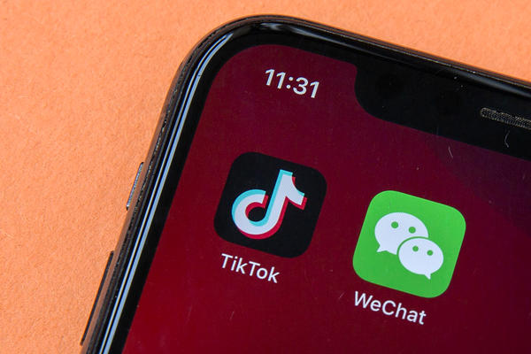 Icons for the smartphone apps TikTok and WeChat are seen on a smartphone screen in Beijing. President Trump said he does not plan to support any deal to save TikTok in the U.S. that keeps China-based ByteDance as its majority owner.