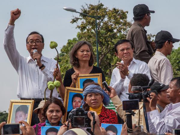 Leaders of the opposition Cambodia National Rescue Party, (from left) Sam Rainsy, Mu Sochua and Kem Sokha, give speeches in Phnom Penh in 2014. Rainsy and Sochua now live in self-imposed exile outside the country, while Sokha has been jailed since 2017.