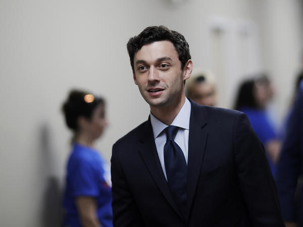 Jon Ossoff leaves a campaign office during a 2017 race after meeting with supporters in Marietta, Ga. Ossoff will face Republican Sen. David Perdue in November.