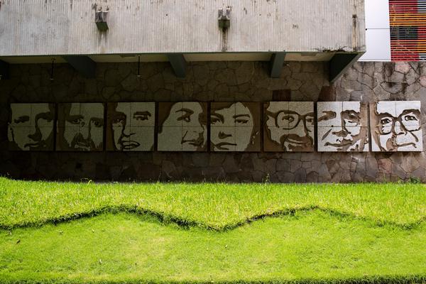 A mural made by artist Josué Villalta on the wall of a building of the José Simeón Cañas Central American University showing the faces of Jesuit priests who were executed by members of the Salvadoran army in 1989.