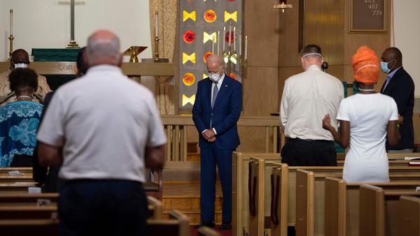 If elected, Democratic nominee Joe Biden would become only the second Catholic president in American history. Here he prays at Grace Lutheran Church in Kenosha, Wis., on Sept. 3.