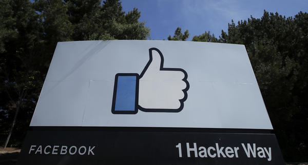The thumbs up Like logo is shown on a sign at Facebook headquarters in Menlo Park, Calif.