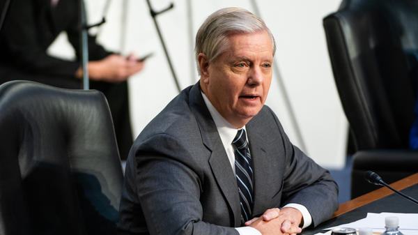 Senate Judiciary Chairman Sen. Lindsey Graham, R-S.C., speaks on the first day of Amy Coney Barrett's Supreme Court confirmation hearing on Capitol Hill on Monday. Graham defended the Republican effort to move swiftly on Barrett's confirmation.