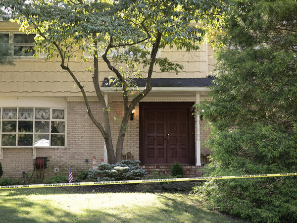 Crime-scene tape surrounds the home of federal Judge Esther Salas in North Brunswick, N.J., on July 20. A gunman shot and killed Salas' 20-year-old son and wounded her husband.